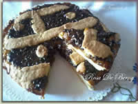 Crostata di frolla montata con marmellata di arance e cioccolato